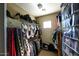 Large walk-in closet with custom organizers at 13612 W Cypress St, Goodyear, AZ 85395