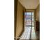 Entryway with tiled floor and stained glass window at 13612 W Cypress St, Goodyear, AZ 85395