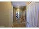 Upstairs hallway with access to bedrooms and closets at 13612 W Cypress St, Goodyear, AZ 85395