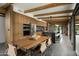 Modern kitchen with island, wood cabinets, and stainless steel appliances at 1442 E Rancho Dr, Phoenix, AZ 85014