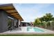 Luxury backyard oasis featuring a refreshing pool and expansive patio at 1442 E Rancho Dr, Phoenix, AZ 85014