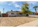 Charming single-story home featuring a low maintenance front yard and a mature shade tree at 14846 N 29Th Ave, Phoenix, AZ 85053