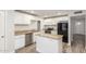 Bright kitchen with stainless steel appliances, granite countertops, and center island at 14846 N 29Th Ave, Phoenix, AZ 85053