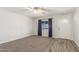 Inviting living room with natural light, ceiling fan, and mixed flooring at 14846 N 29Th Ave, Phoenix, AZ 85053