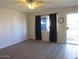 Spacious living room with carpet flooring and large window at 14846 N 29Th Ave, Phoenix, AZ 85053