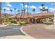 Welcoming community entrance with covered parking and landscaped grounds at 14950 W Mountain View Blvd # 3209, Surprise, AZ 85374