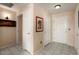Inviting entryway with tiled floors and neutral wall colors at 14950 W Mountain View Blvd # 3209, Surprise, AZ 85374