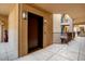 Clean and well-lit hallway with elevator access at 14950 W Mountain View Blvd # 3209, Surprise, AZ 85374