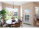Cozy kitchen nook with a table and chairs, offering lots of natural light at 14950 W Mountain View Blvd # 3209, Surprise, AZ 85374