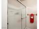 Shower with glass enclosure and red towel at 14950 W Mountain View Blvd # 3209, Surprise, AZ 85374