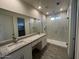 Elegant bathroom with double vanity and glass shower at 15200 S Diablo Rd, Arizona City, AZ 85123