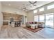 Open concept living room, kitchen, and dining area at 15200 S Diablo Rd, Arizona City, AZ 85123