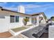 Bright white house with a walkway to the front door, and nicely landscaped yard at 1546 E 3Rd St, Mesa, AZ 85203