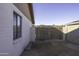 Backyard view showing a gate and a section of block wall at 16245 N 43Rd Dr, Glendale, AZ 85306