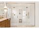 Spa-like bathroom with double shower heads and marble vanity at 16442 N 58Th St, Scottsdale, AZ 85254