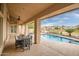 Inviting patio with pool, spa, and outdoor dining area at 1757 E Saltsage Dr, Phoenix, AZ 85048