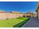 Backyard features putting green, gazebo, basketball hoop and outdoor seating at 21754 E Caldwells Ct, Queen Creek, AZ 85142