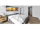Bright bedroom features luxury vinyl floors, recessed lights, and closet space at 2323 N Central Ave # 502, Phoenix, AZ 85004