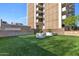Resident dog park with artificial turf and modern planters at 2323 N Central Ave # 502, Phoenix, AZ 85004