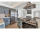 Updated kitchen featuring stainless steel appliances, gray cabinets and a large central island and modern fixtures at 2323 N Central Ave # 502, Phoenix, AZ 85004