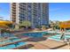 Inviting pool area with lounge chairs and modern umbrellas at 2323 N Central Ave # 502, Phoenix, AZ 85004