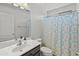 Clean bathroom with shower, toilet and vanity at 2403 W Via Dona Rd, Phoenix, AZ 85085