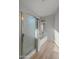 Relaxing bathroom with soaking tub and walk-in shower at 2403 W Via Dona Rd, Phoenix, AZ 85085