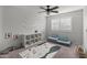 Charming bedroom with plenty of natural light and comfortable seating at 2403 W Via Dona Rd, Phoenix, AZ 85085