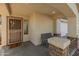 Front entry with security door and a welcoming bench at 2403 W Via Dona Rd, Phoenix, AZ 85085