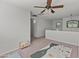 Bright loft space with ceiling fan, ideal for a home office or play area at 2403 W Via Dona Rd, Phoenix, AZ 85085