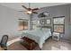 Spacious main bedroom with high ceilings and natural light at 2403 W Via Dona Rd, Phoenix, AZ 85085