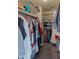 Spacious walk-in closet with ample shelving and hanging space at 2403 W Via Dona Rd, Phoenix, AZ 85085