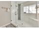 Large walk-in shower with glass enclosure and tile surround at 2502 E Elm St, Phoenix, AZ 85016