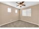 Bedroom with window and ceiling fan at 29350 N 22Nd Ave, Phoenix, AZ 85085