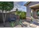 Charming backyard patio with bistro set, surrounded by desert landscaping at 30407 N 54Th St, Cave Creek, AZ 85331