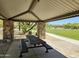 Community picnic area with shaded tables and benches at 30407 N 54Th St, Cave Creek, AZ 85331