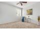 Well-lit bedroom featuring a comfy armchair and tasteful wall art at 3060 N Ridgecrest -- # 98, Mesa, AZ 85207