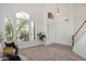 Two-story living room with high ceilings and natural light at 3060 N Ridgecrest -- # 98, Mesa, AZ 85207