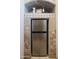 Built-in wine cooler in alcove with shelving at 317 W Olesen Rd, Phoenix, AZ 85085