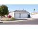 Two-story house with a three-car garage and landscaping at 3528 E Decatur St, Mesa, AZ 85213