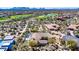 Luxury home with pool, putting green, and distant mountain views at 37181 N 103Rd St, Scottsdale, AZ 85262