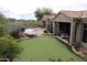 Luxury home with putting green, pool, and scenic mountain views at 37181 N 103Rd St, Scottsdale, AZ 85262