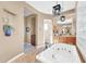 Spa-like bathroom with soaking tub and dual vanity at 37181 N 103Rd St, Scottsdale, AZ 85262