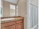 Clean bathroom with tiled flooring and wood vanity at 37181 N 103Rd St, Scottsdale, AZ 85262