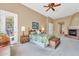 Bright bedroom with fireplace and access to backyard at 37181 N 103Rd St, Scottsdale, AZ 85262