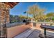 Outdoor grill and dining area in community at 37181 N 103Rd St, Scottsdale, AZ 85262