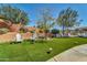 Landscaped community lawn with seating at 37181 N 103Rd St, Scottsdale, AZ 85262