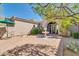 Outdoor patio area with fountain and seating area at 37181 N 103Rd St, Scottsdale, AZ 85262