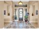 Elegant entryway with tiled flooring and recessed lighting at 37181 N 103Rd St, Scottsdale, AZ 85262