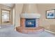 Brick fireplace in a spacious bedroom at 37181 N 103Rd St, Scottsdale, AZ 85262